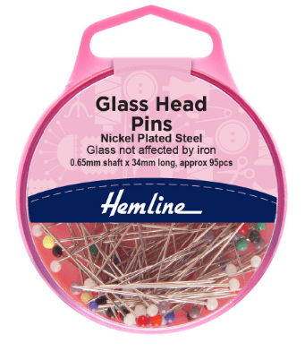 Lasipäinen nuppineula, Hemline